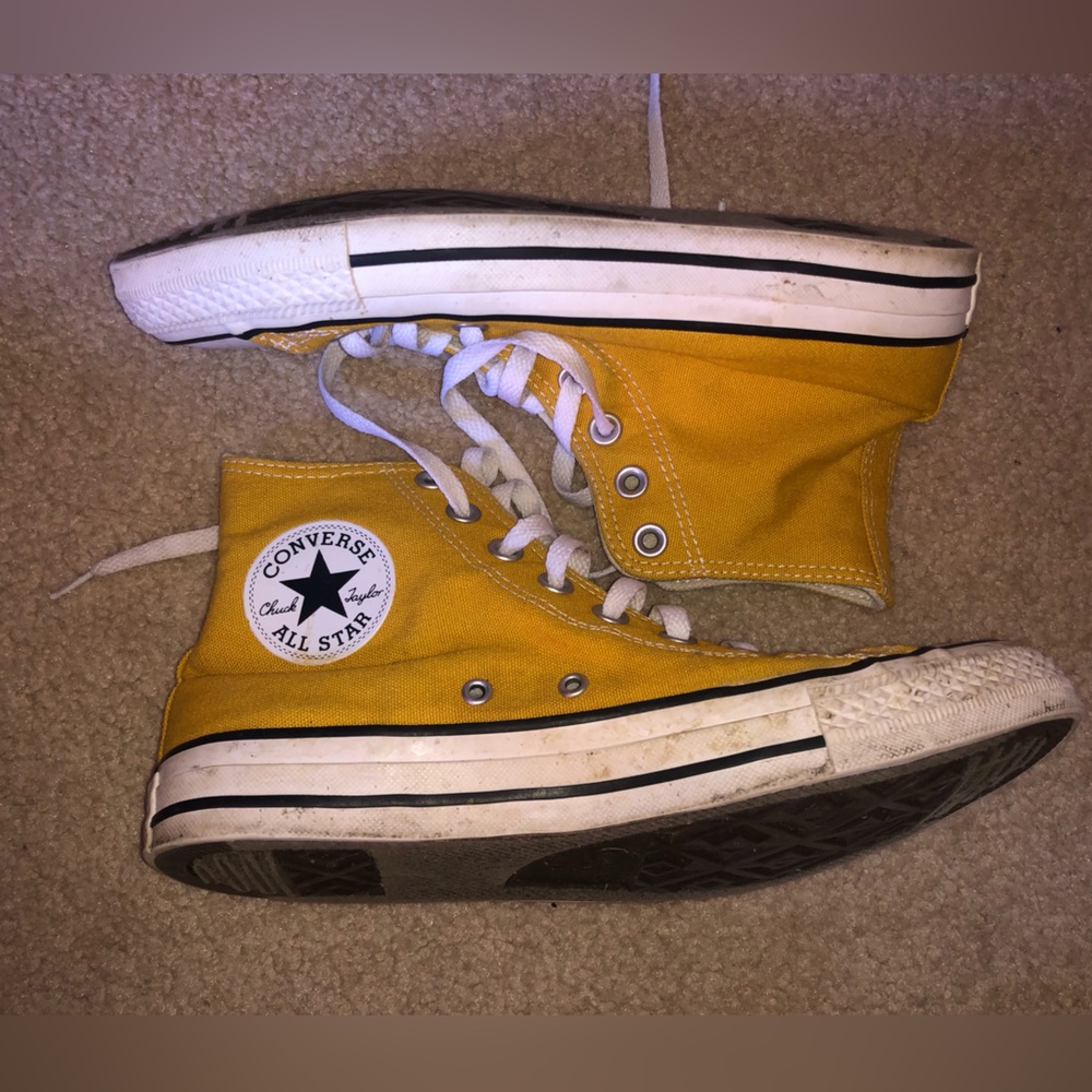 Yellow high top chucks. Size 6.5 mens 8.5 womens.